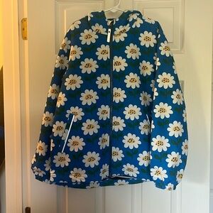 Never worn raincoat with reflective accents